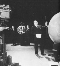 Dimbleby demonstrates the principles with out-of-scale models