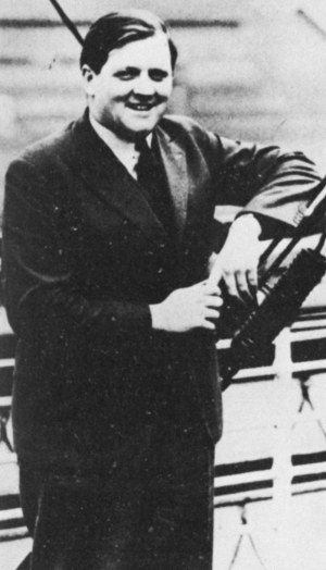 A man on a deck of a ship