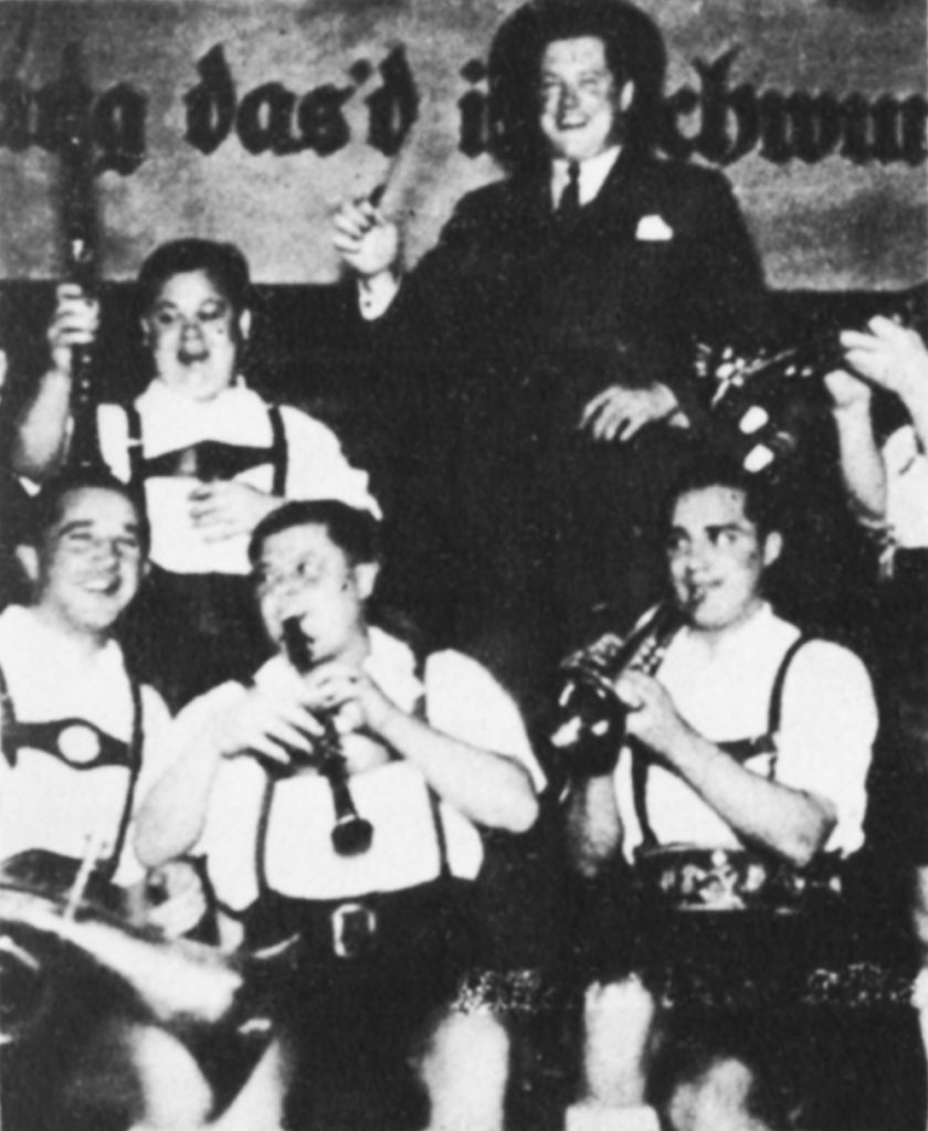 Richard Dimbleby with a German band