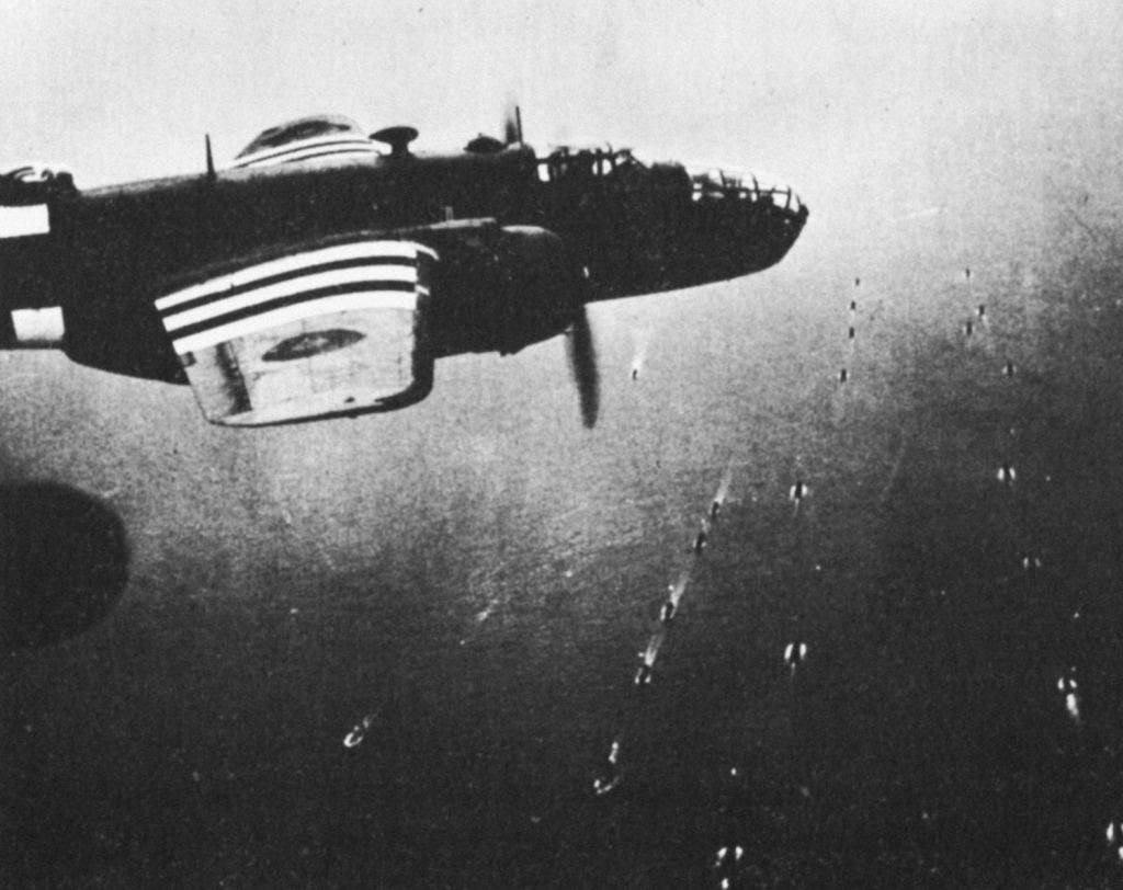 Aerial view of a bombing run; another plane is visible