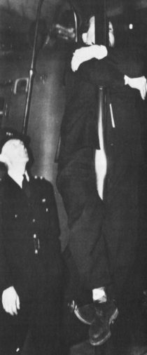 Dimbleby slides down a fireman's pole