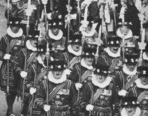 Yeomen Warders of Her Majesty's Royal Palace and Fortress the Tower of London, and Members of the Sovereign's Body Guard of the Yeoman Guard Extraordinary march