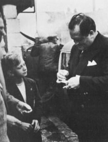 Dimbleby signs autographs for boys